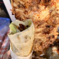 shawarma chicken lettuce_ pickles_ garlic sauce